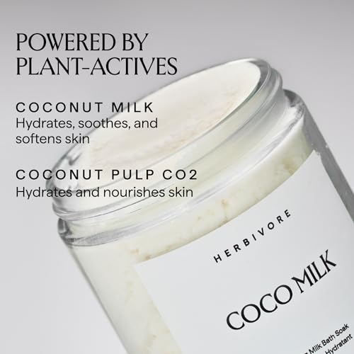 Herbivore Coconut Milk Bath Soak in a glass jar, showing creamy white bath salts with coconut flakes and a natural, soothing appearance