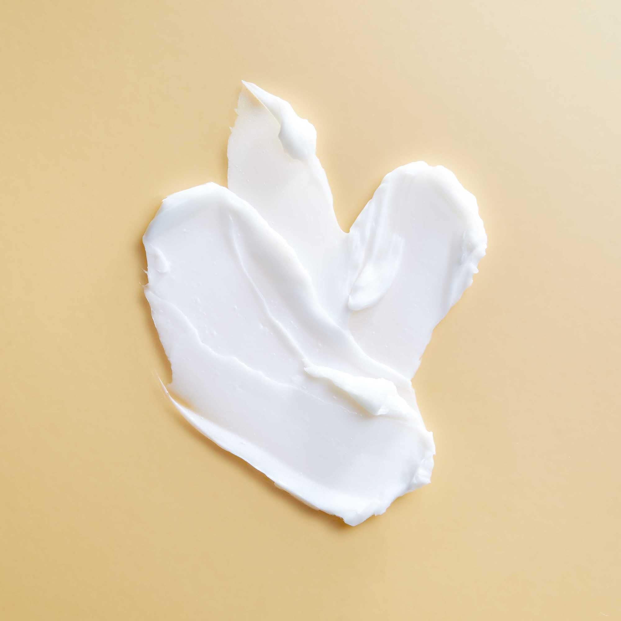 Pattern Beauty Medium Conditioner for curly hair, hydrating and slip-enhancing, in a sleek bottle with the Pattern Beauty logo.