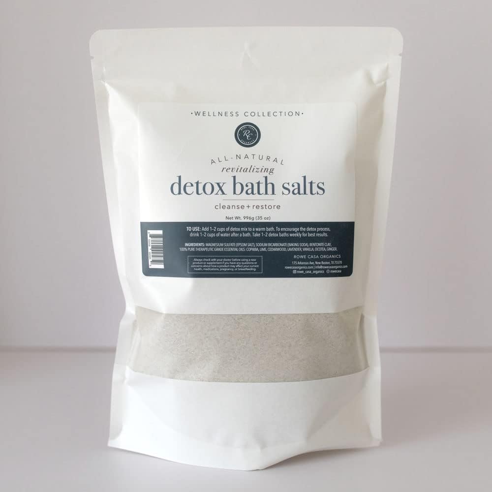 Rowe Casa Organics Detox Bath Salts with magnesium and bentonite clay, featuring natural mineral ingredients and soothing textures.