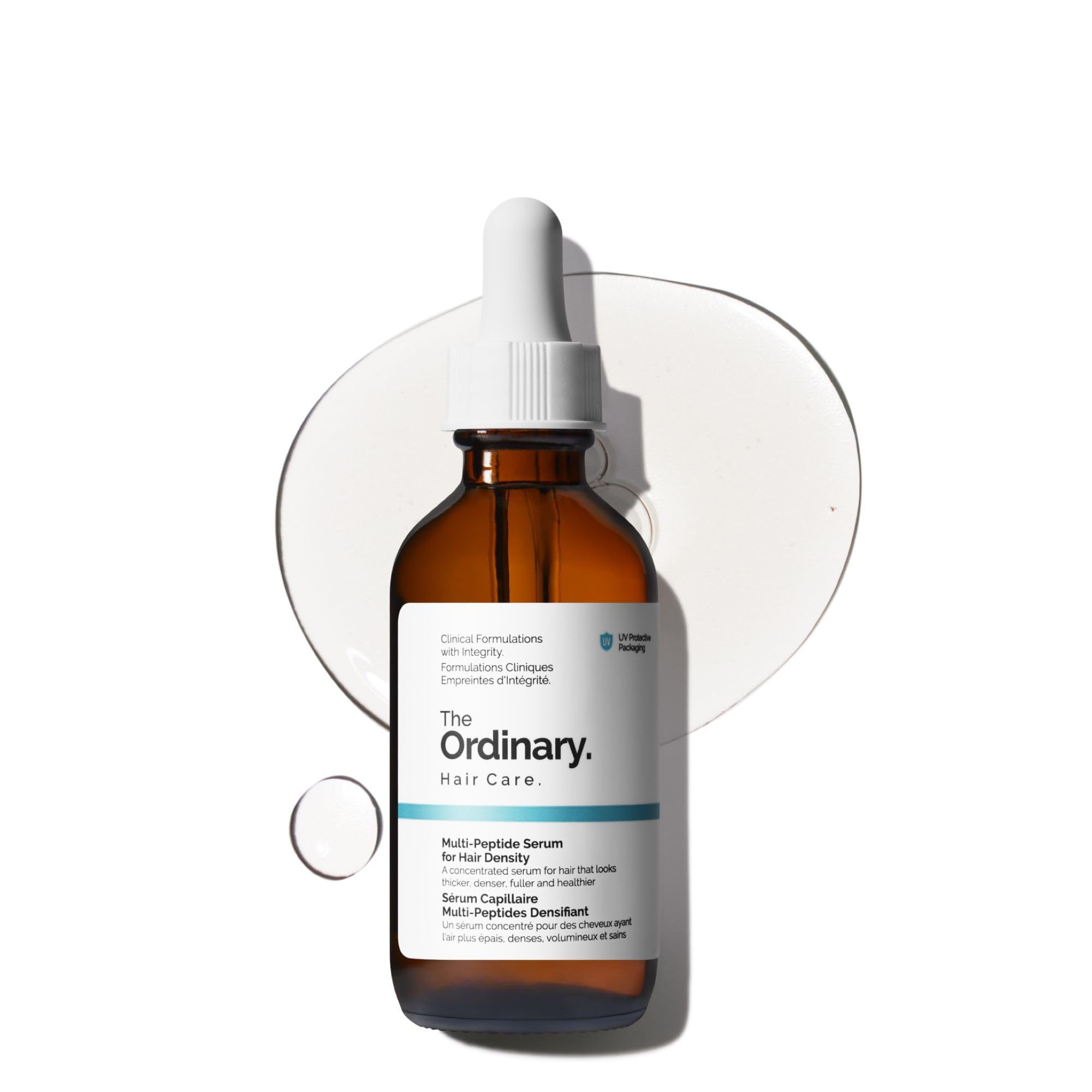 The Ordinary Multi-Peptide Serum for Hair Density bottle with dropper, clear liquid inside, placed on a white background.
