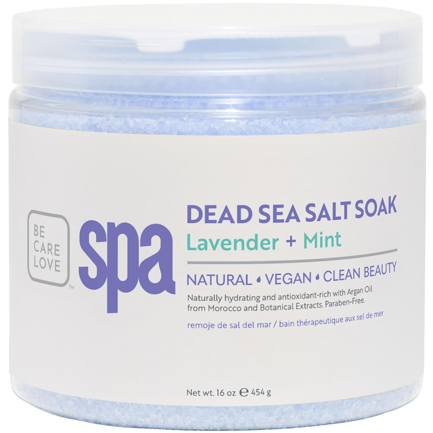 Be Care Love Spa Dead Sea Salt Soak in a clear jar with white bath salts and a wooden scoop, ready for relaxing bath use.