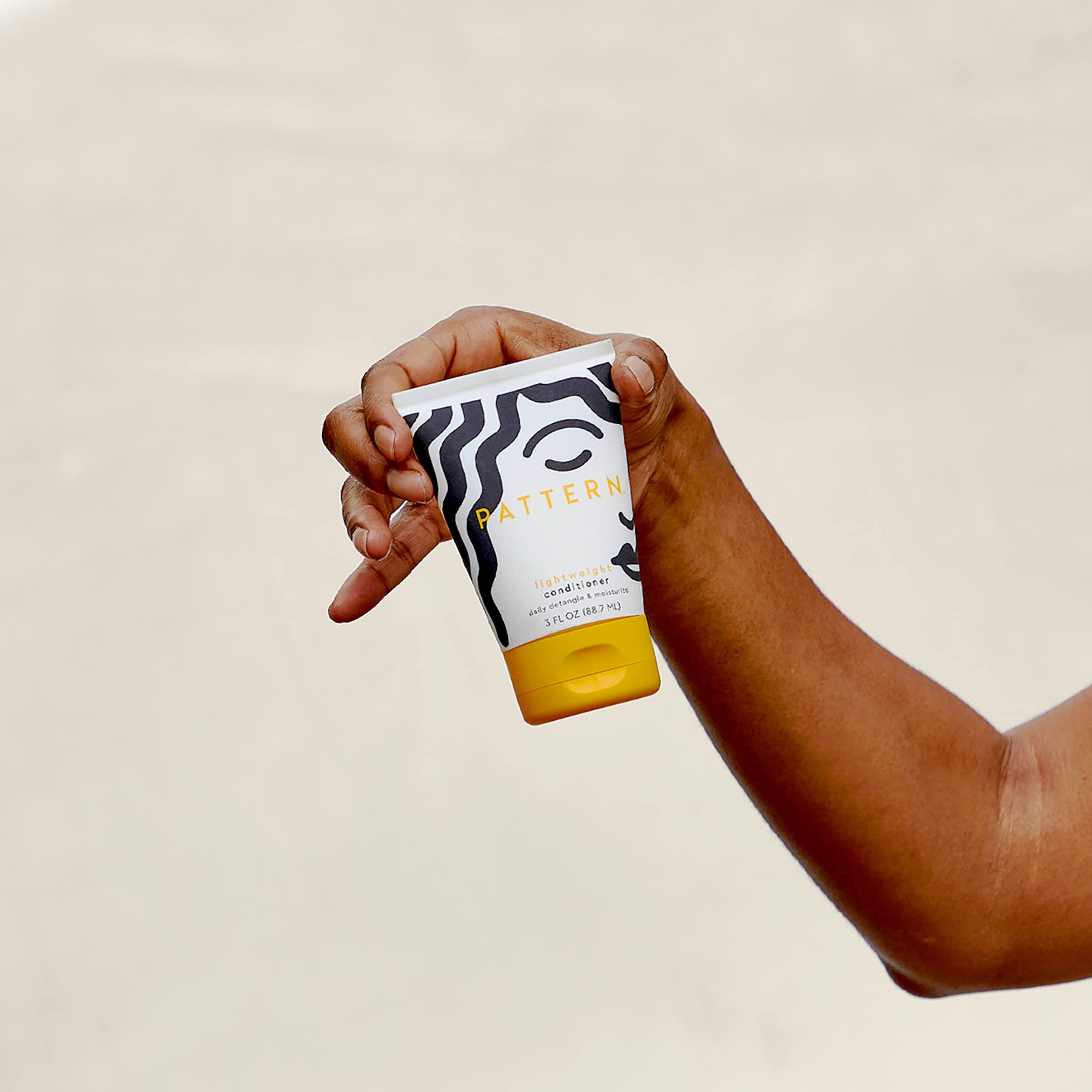 Pattern Beauty lightweight conditioner and co-wash bottle with pump, designed for textured and curly hair care.