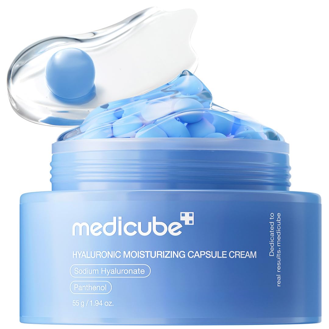 Medicube Capsule Cream with Deep Vitamin C in a jar, showing the cream's smooth texture and packaging with orange accents.