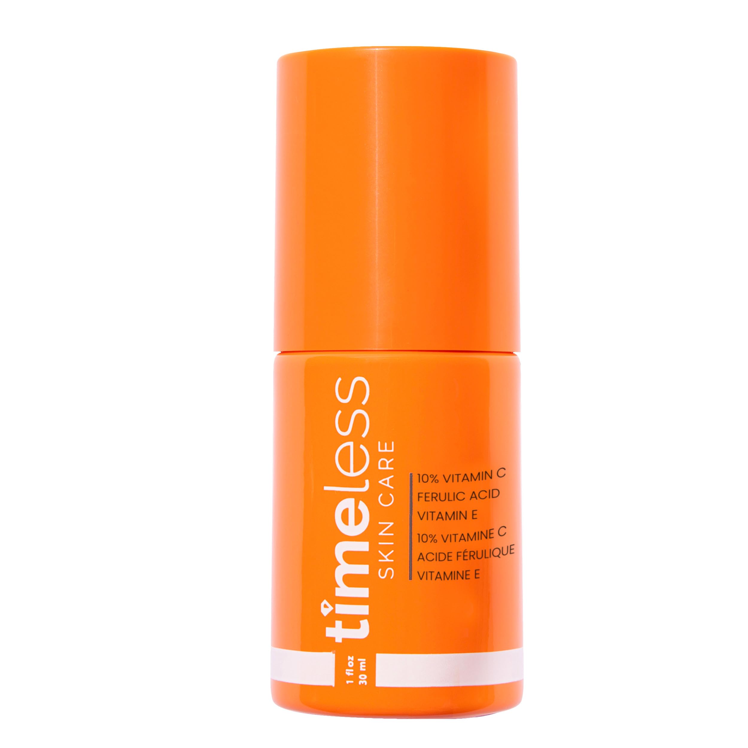 Timeless Vitamin C Serum with Vitamin E and Ferulic Acid in a clear dropper bottle, showing the serum's orange hue.