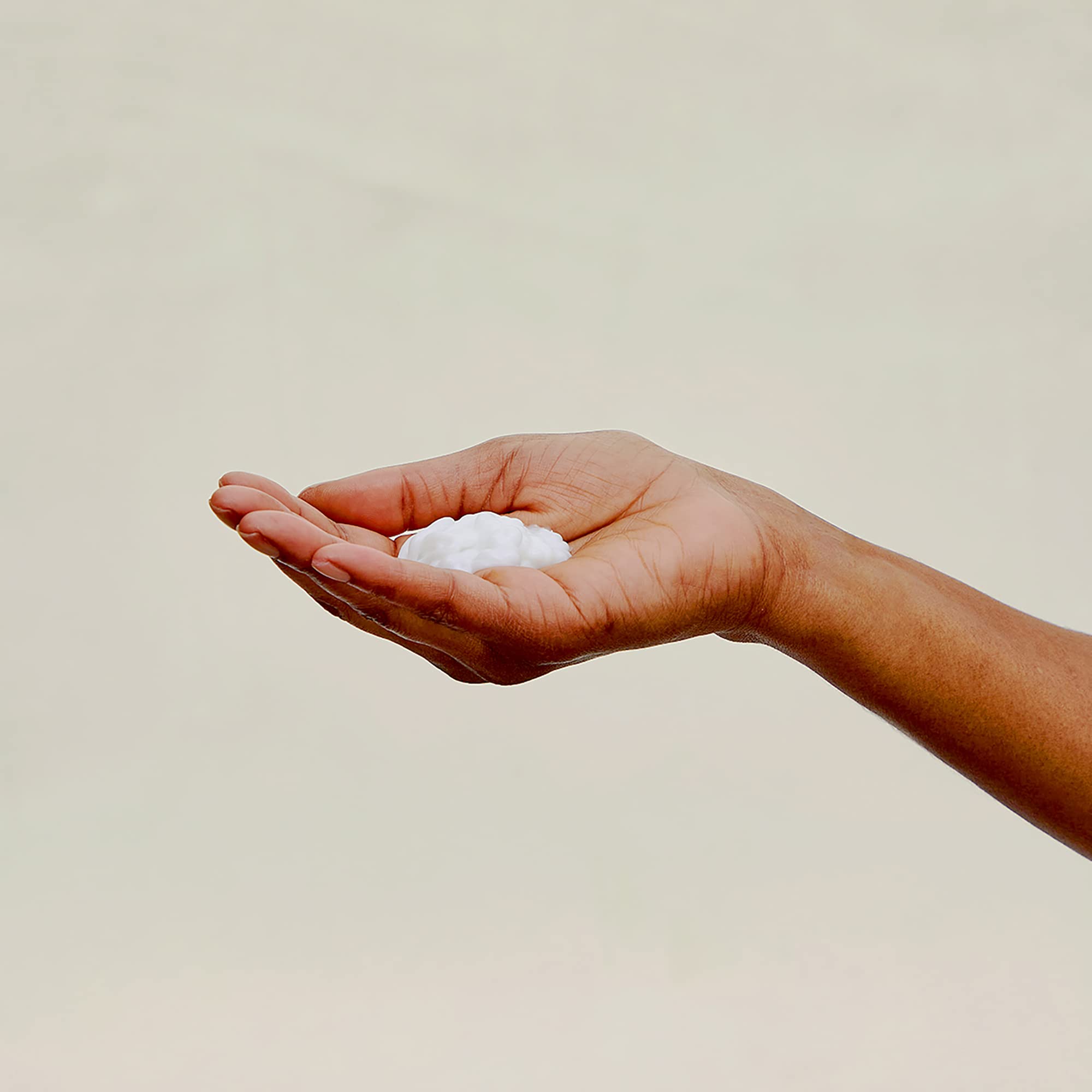 Pattern Beauty lightweight conditioner and co-wash bottle with black and white label, designed for curly hair care.