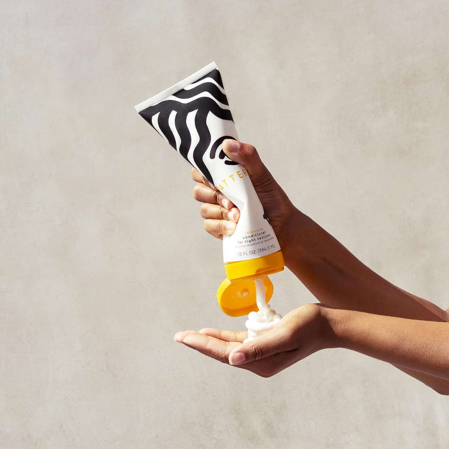 Pattern Beauty Intensive Conditioner bottle with pump, designed for curly and textured hair care by Tracee Ellis Ross.