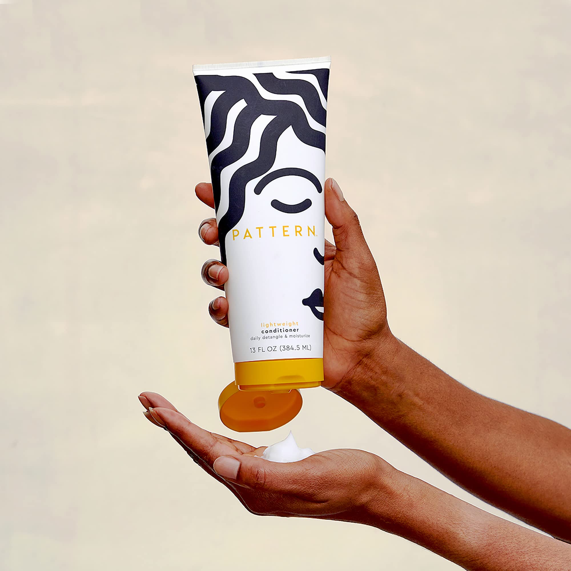 Pattern Beauty lightweight conditioner and co-wash bottle, hydrating hair care product for textured hair, by Tracee Ellis Ross.