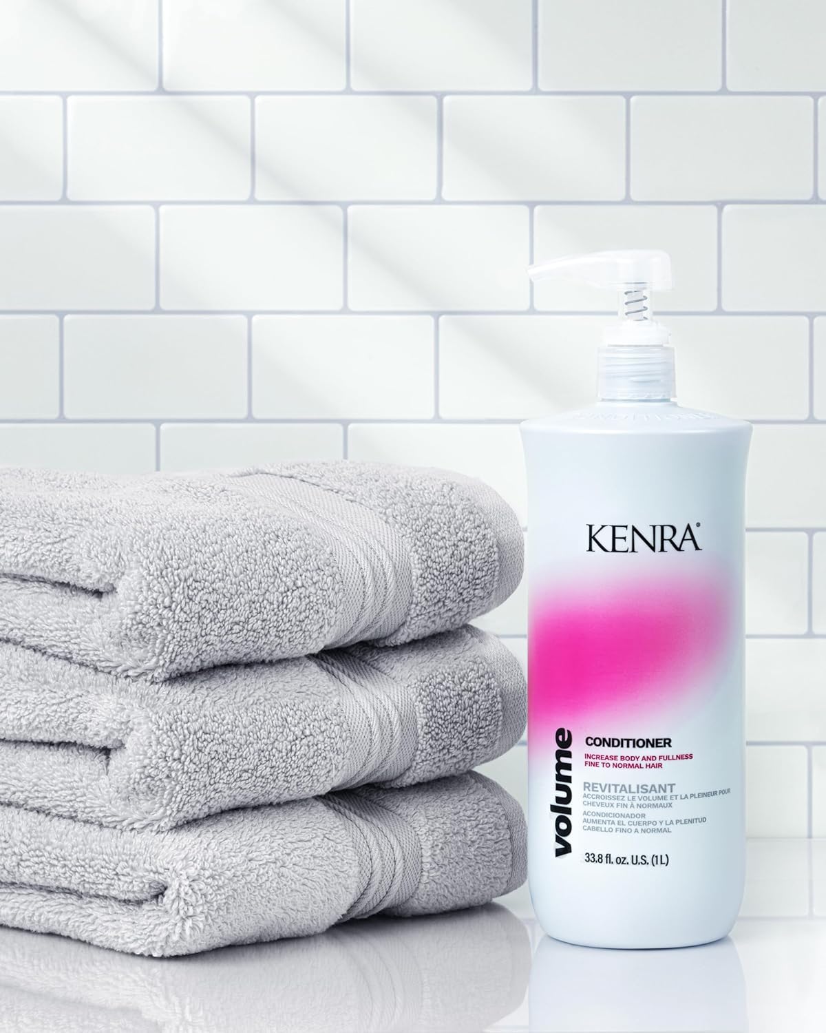 Kerna Volume Conditioner bottle with pump dispenser, white and green packaging, designed to add volume and thickness to hair