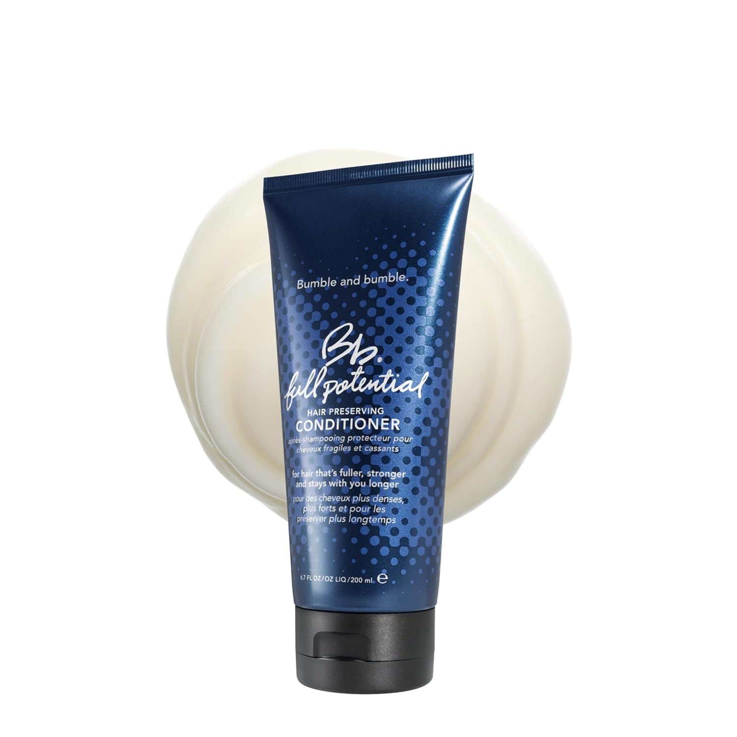 Bumble & Bumble Full Potential Hair Preserving Conditioner bottle with pump dispenser, creamy conditioner in a sleek white container.