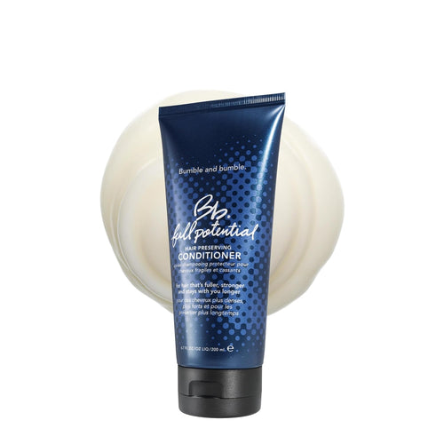 Bumble & Bumble Full Potential Hair Preserving Conditioner bottle with pump dispenser, creamy conditioner in a sleek white container.