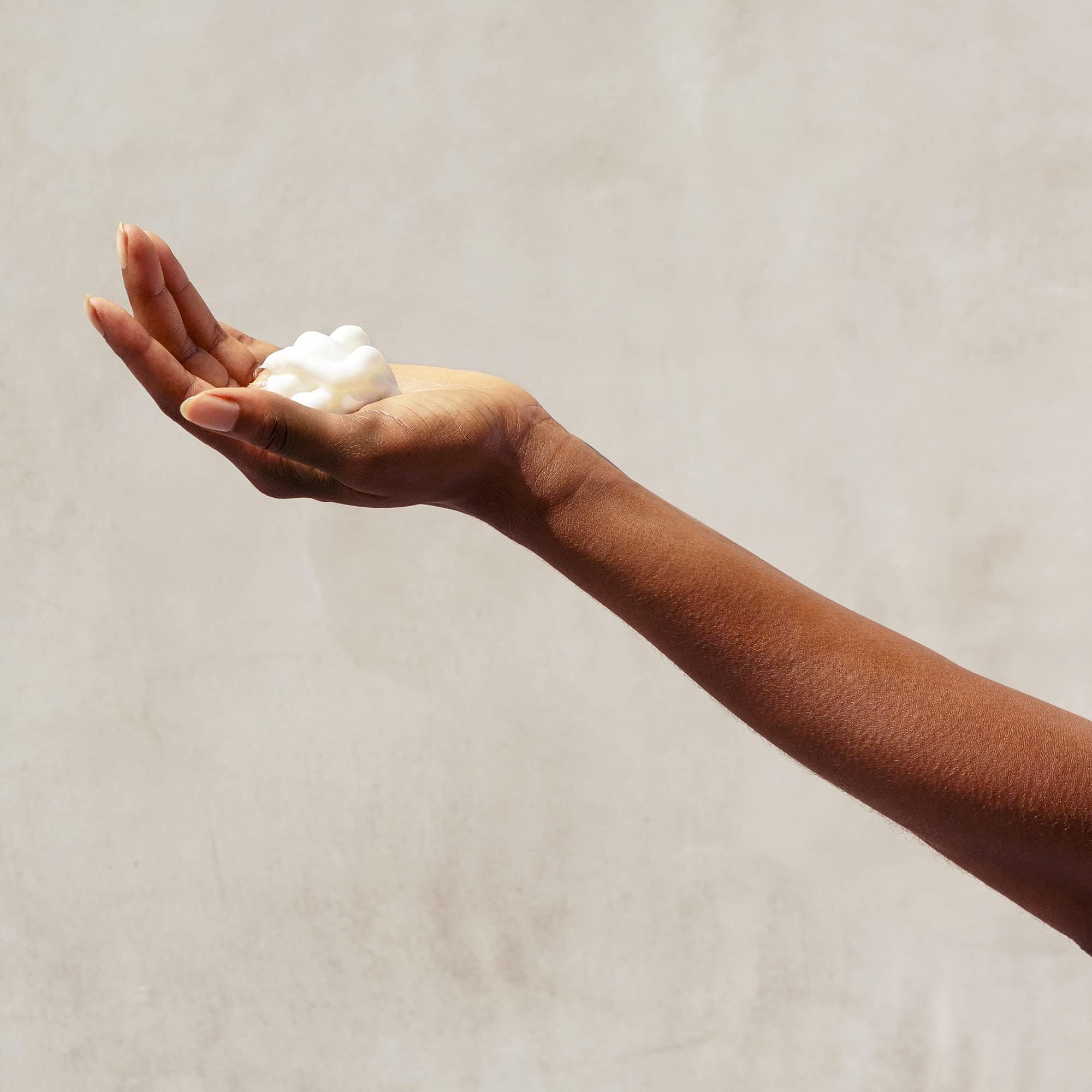 Pattern Beauty Curl Mousse in a pump bottle, designed for defining and enhancing curly hair with lightweight, flexible hold.