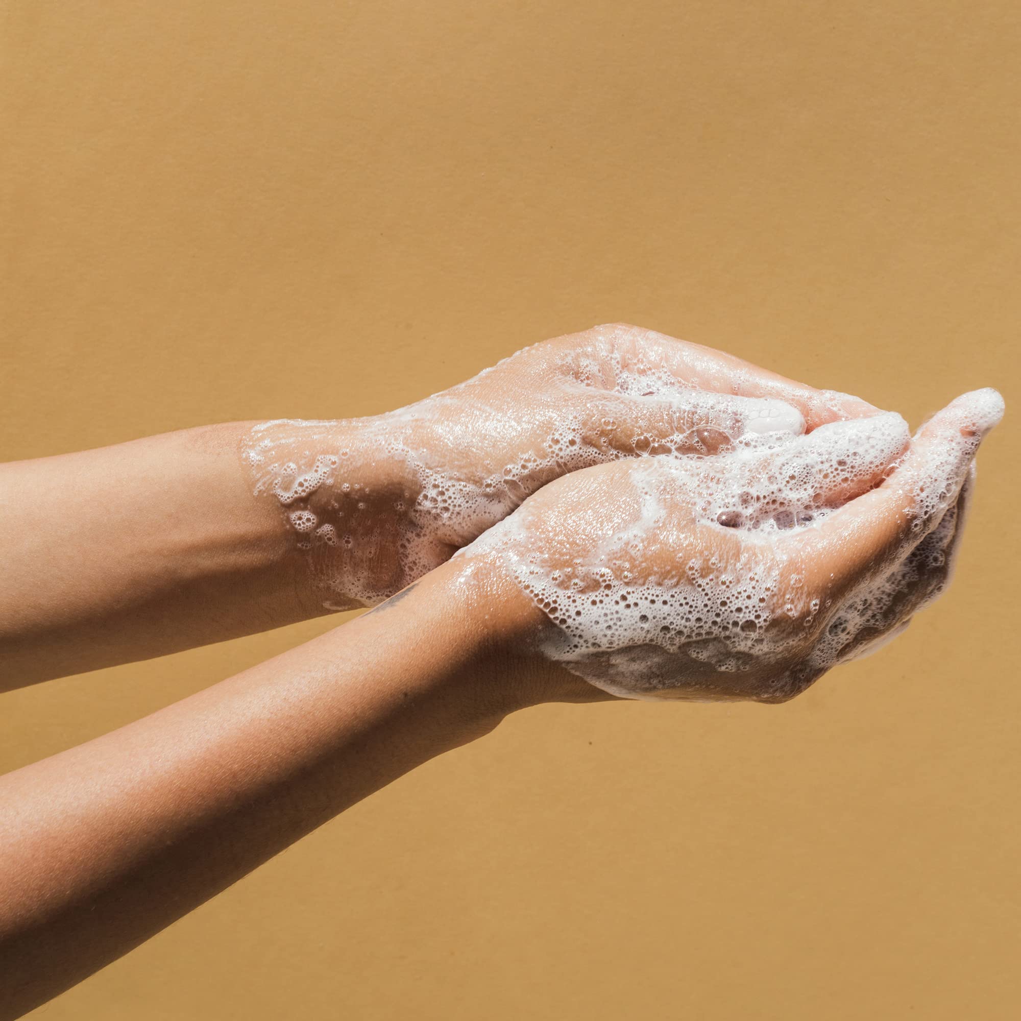 Pattern Beauty Hydration Shampoo in a clear bottle with a pump dispenser, designed for curly hair hydration and care.