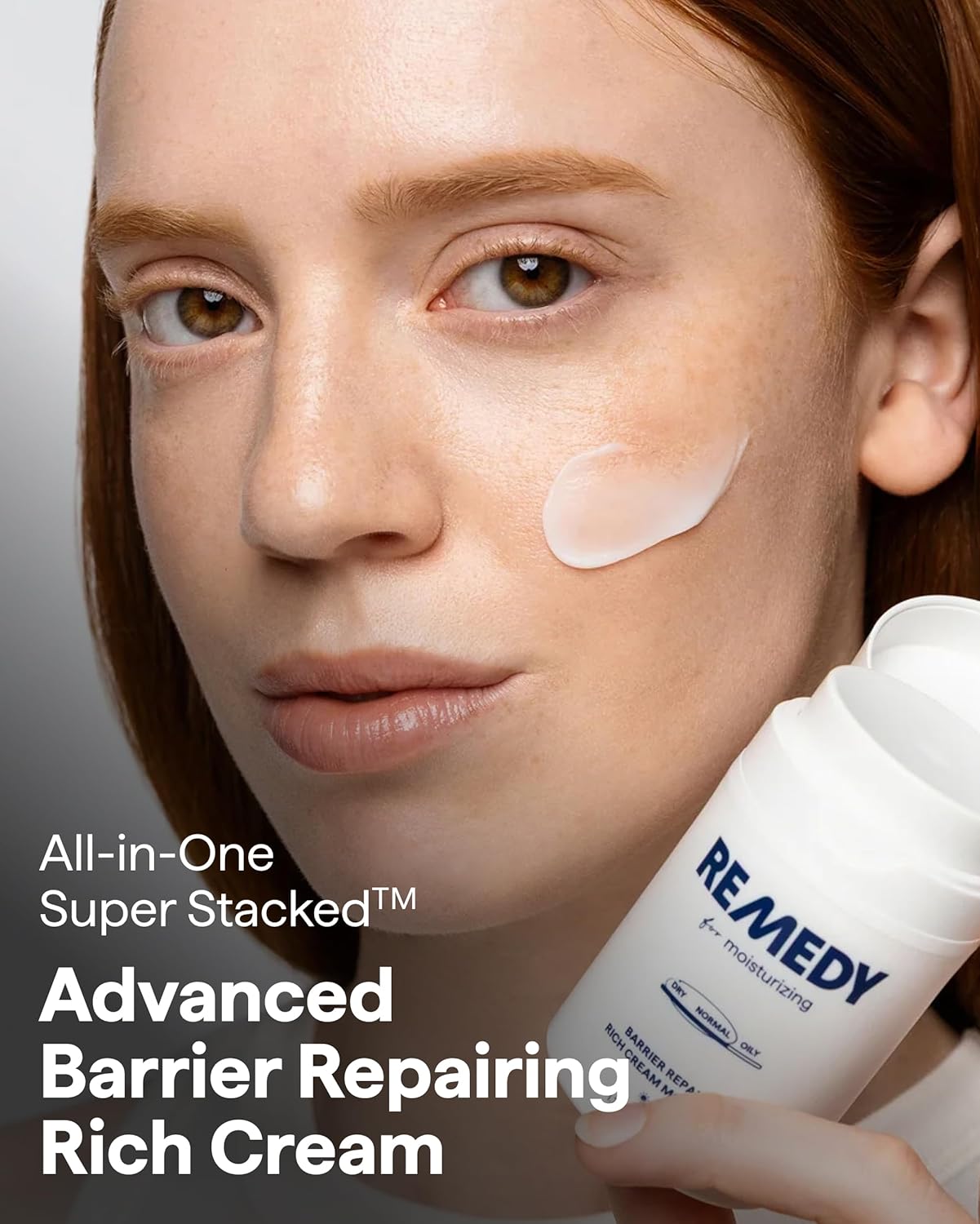 Bottle of Remedy Science Rich Moisture Remedy, moisturizing skincare product in a white pump bottle with blue accents.