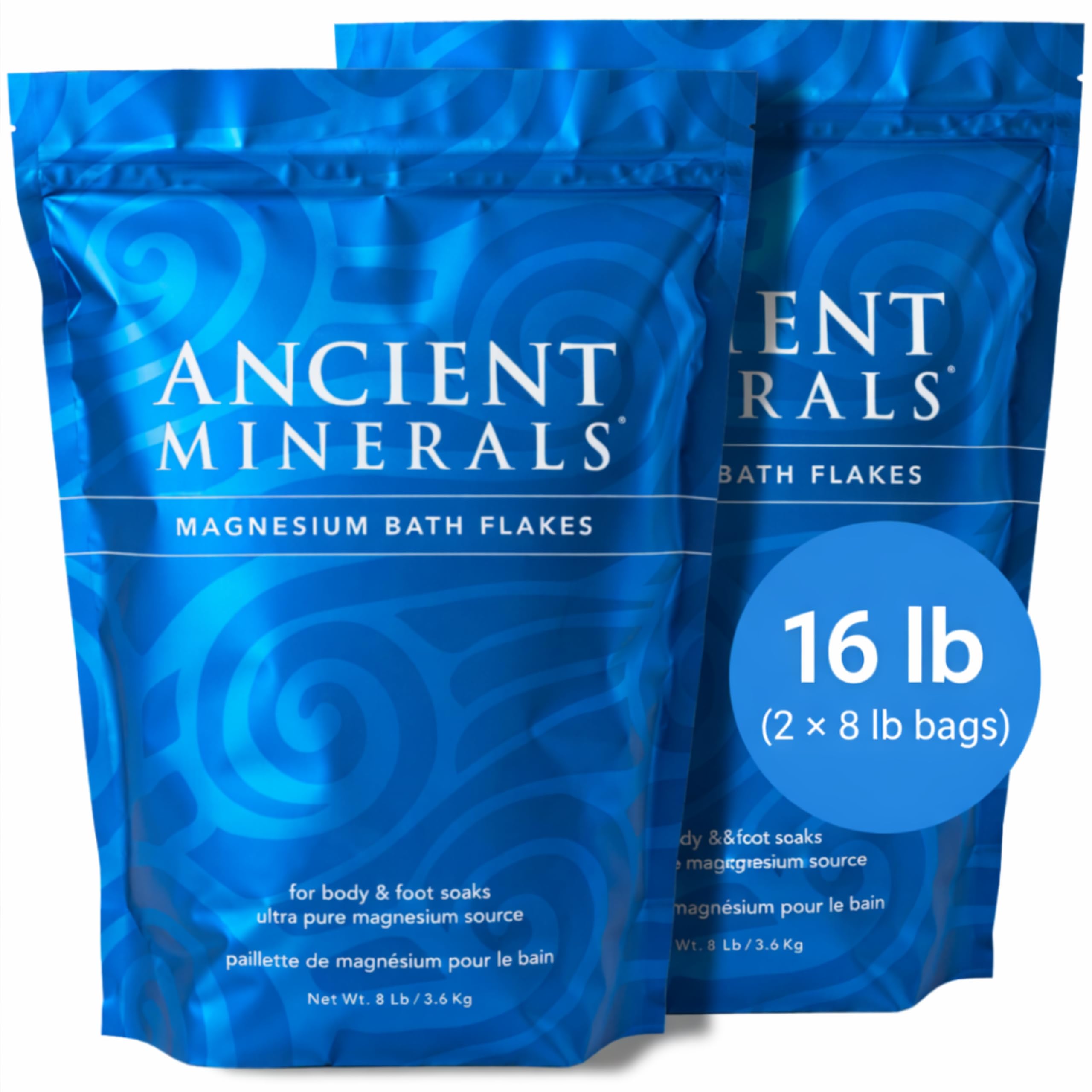 Ancient Minerals Magnesium Bath Flakes in a bowl, showing the textured magnesium flakes for relaxing bath soaks.