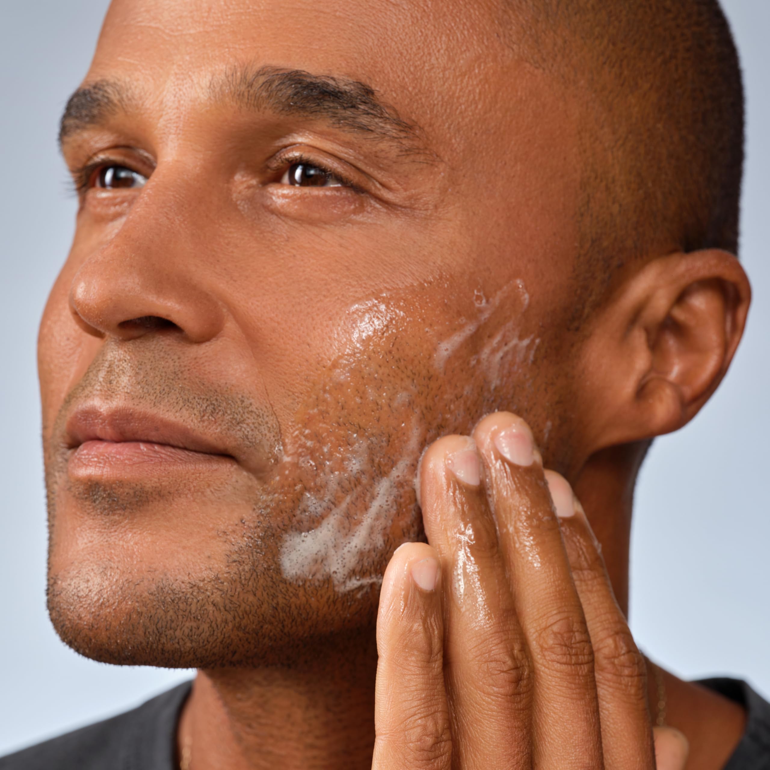 Caldera + Lab The Clean Slate men's organic foaming facial cleanser in a pump bottle, ready for skincare use.